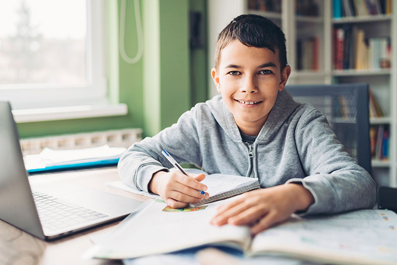 Acadience student studying at home