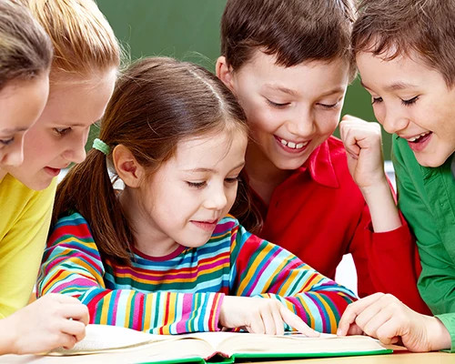 Students reading at table