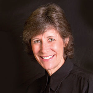 dr-lucy-hart-paulson-new a close-up of a person smiling