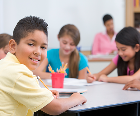 REWARDS student smiling and facing camera